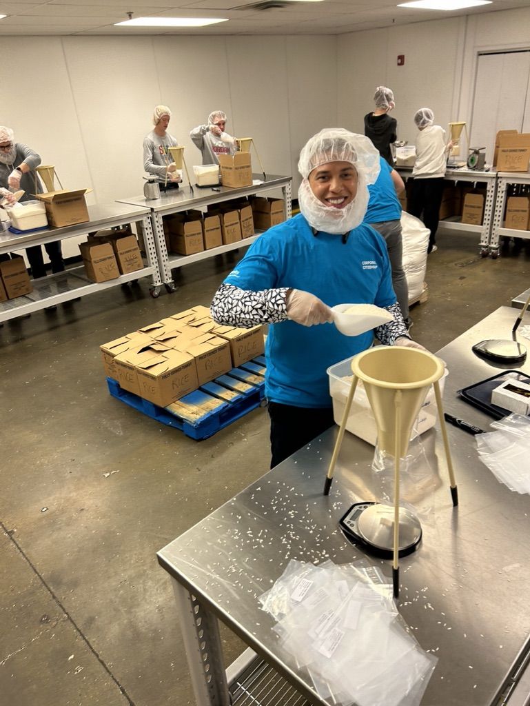 Aaron volunteering at community food bank